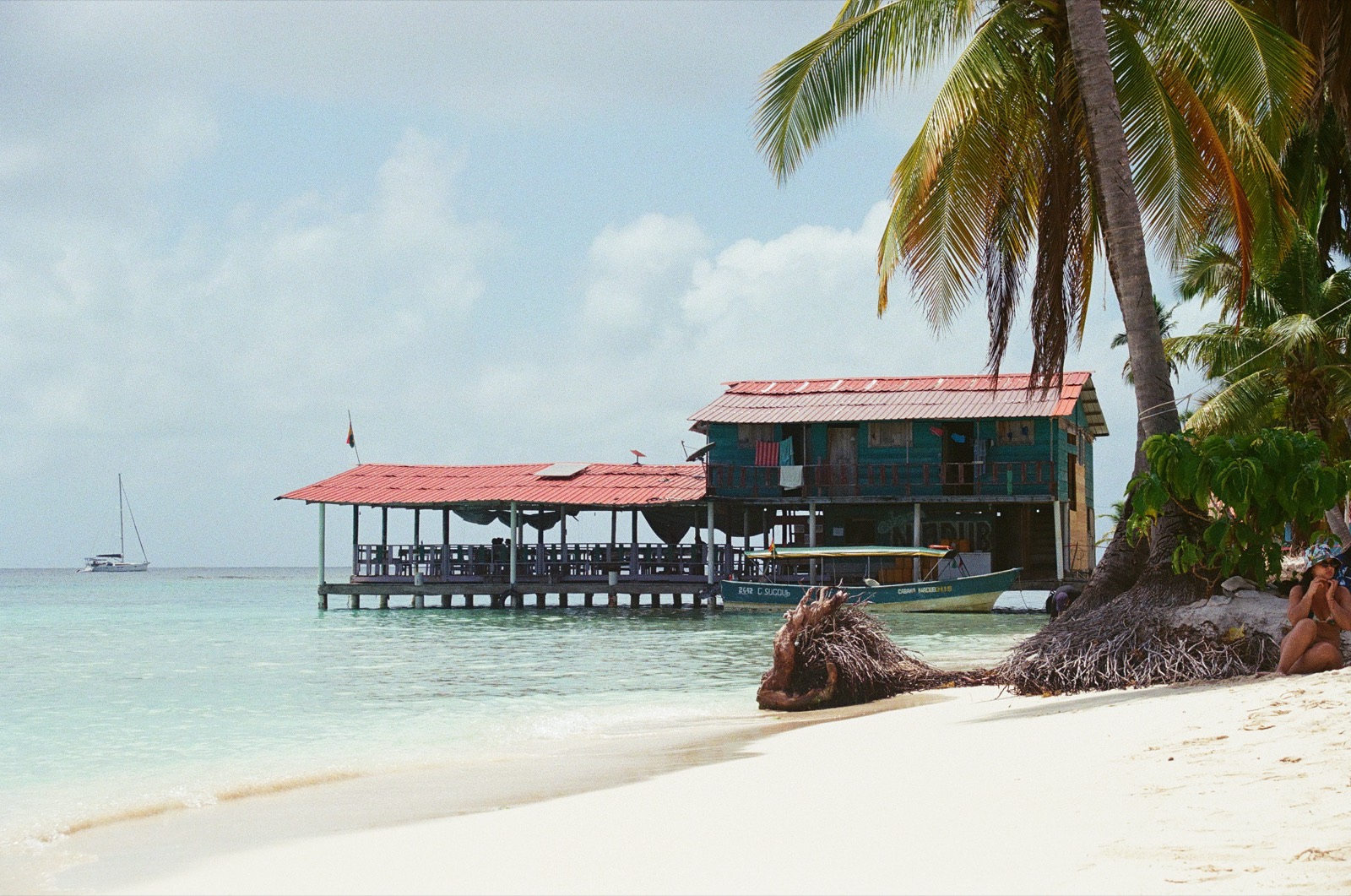 Stilt house over turquoise water